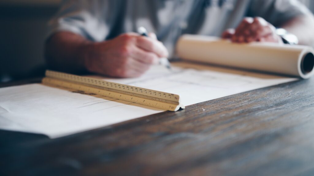 Image showing planning drawings, a ruler and a pen.